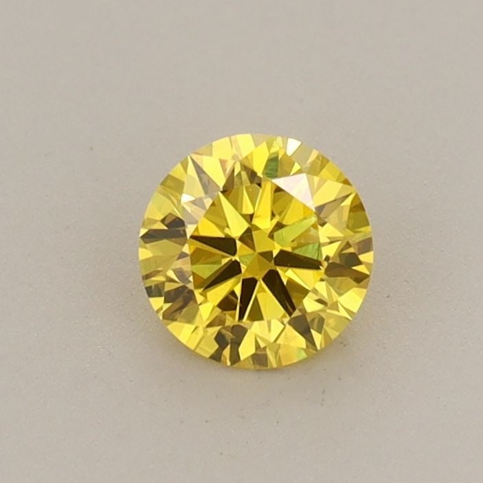 Loose Diamond - ROUND 0.37ct Fancy Vivid Yellow SI1: Loose Diamond - ROUND 0.37ct Fancy Vivid Yellow SI1 Source: This is a real non-mined Diamond that has been grown in a lab Shape: ROUND Carats: 0.37 Color: Fancy Vivid Yellow Certification: IGI Video: