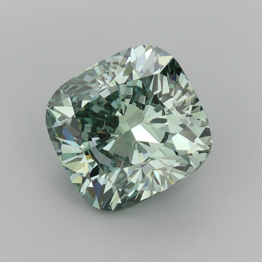 Loose Diamond - CUSHION MODIFIED 3.07ct Fancy Vivid Green VVS2: Loose Diamond - CUSHION MODIFIED 3.07ct Fancy Vivid Green VVS2 Source: This is a real non-mined Diamond that has been grown in a lab Shape: CUSHION MODIFIED Carats: 3.07 Color: Fancy Vivid Green Certi