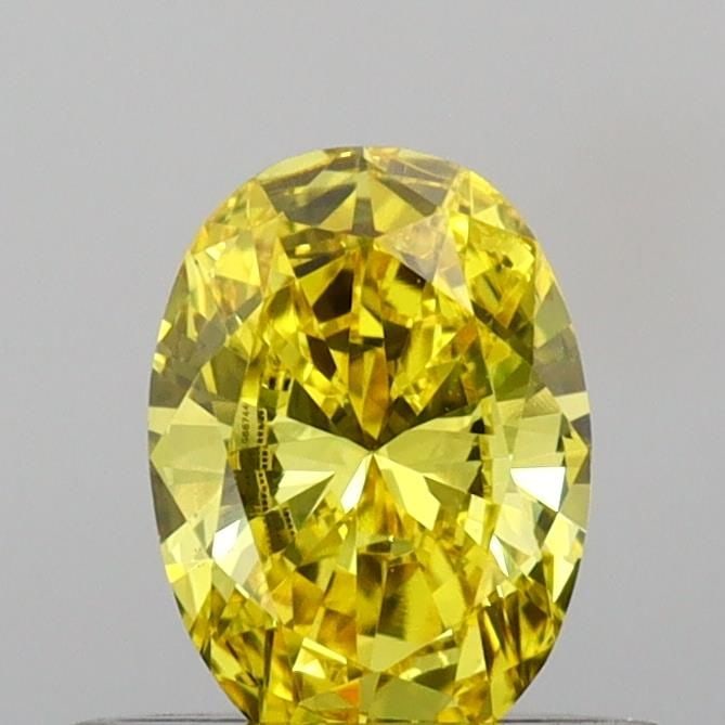 Loose Diamond - OVAL 0.46ct Fancy Vivid Yellow VS1: Loose Diamond - OVAL 0.46ct Fancy Vivid Yellow VS1 Source: This is a real non-mined Diamond that has been grown in a lab Shape: OVAL Carats: 0.46 Color: Fancy Vivid Yellow Certification: IGI Video: