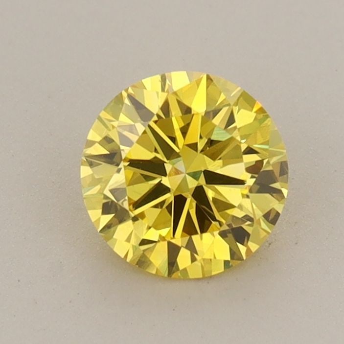 Loose Diamond - ROUND 0.72ct Fancy Vivid Yellow VS1: Loose Diamond - ROUND 0.72ct Fancy Vivid Yellow VS1 Source: This is a real non-mined Diamond that has been grown in a lab Shape: ROUND Carats: 0.72 Color: Fancy Vivid Yellow Certification: IGI Video: