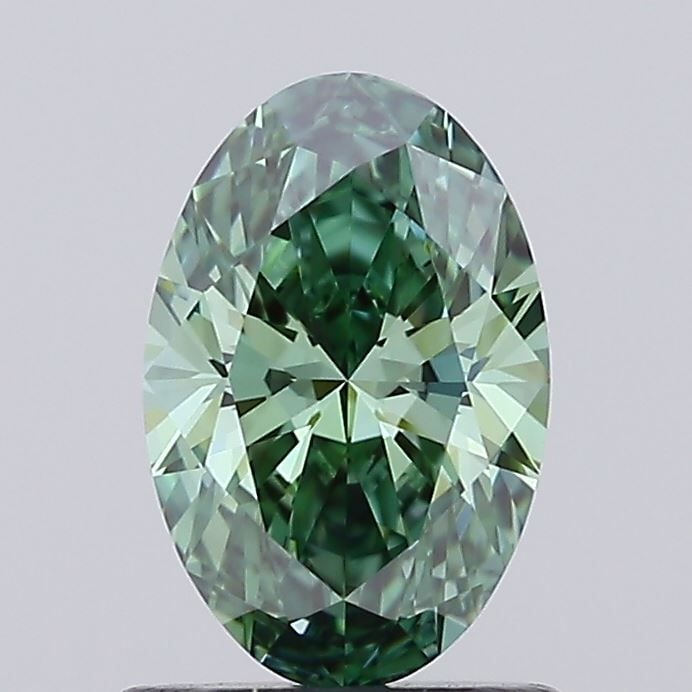 Loose Diamond - OVAL 0.99ct Fancy Vivid Green VVS2: Loose Diamond - OVAL 0.99ct Fancy Vivid Green VVS2 Source: This is a real non-mined Diamond that has been grown in a lab Shape: OVAL Carats: 0.99 Color: Fancy Vivid Green Certification: IGI Video: