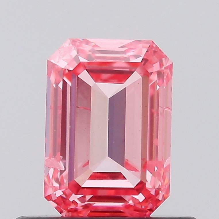 Loose Diamond - EMERALD 0.7ct Fancy Vivid Pink SI2: Loose Diamond - EMERALD 0.7ct Fancy Vivid Pink SI2 Source: This is a real non-mined Diamond that has been grown in a lab Shape: EMERALD Carats: 0.7 Color: Fancy Vivid Pink Certification: IGI Video: