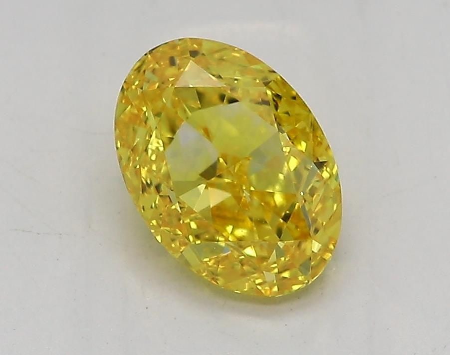Loose Diamond - OVAL 1.3ct Fancy Vivid Yellow VVS1: Loose Diamond - OVAL 1.3ct Fancy Vivid Yellow VVS1 Source: This is a real non-mined Diamond that has been grown in a lab Shape: OVAL Carats: 1.3 Color: Fancy Vivid Yellow Certification: IGI Video: