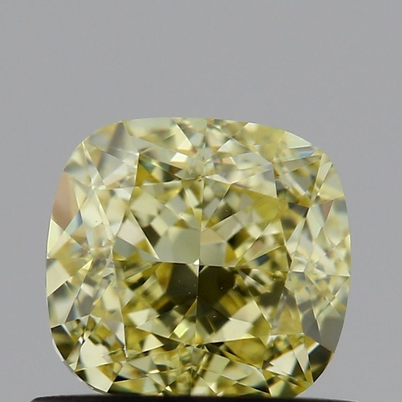 Loose Diamond - CUSHION MODIFIED 0.73ct Fancy Yellow VS1: Loose Diamond - CUSHION MODIFIED 0.73ct Fancy Yellow VS1 Source: This is a real non-mined Diamond that has been grown in a lab Shape: CUSHION MODIFIED Carats: 0.73 Color: Fancy Yellow Certification: I