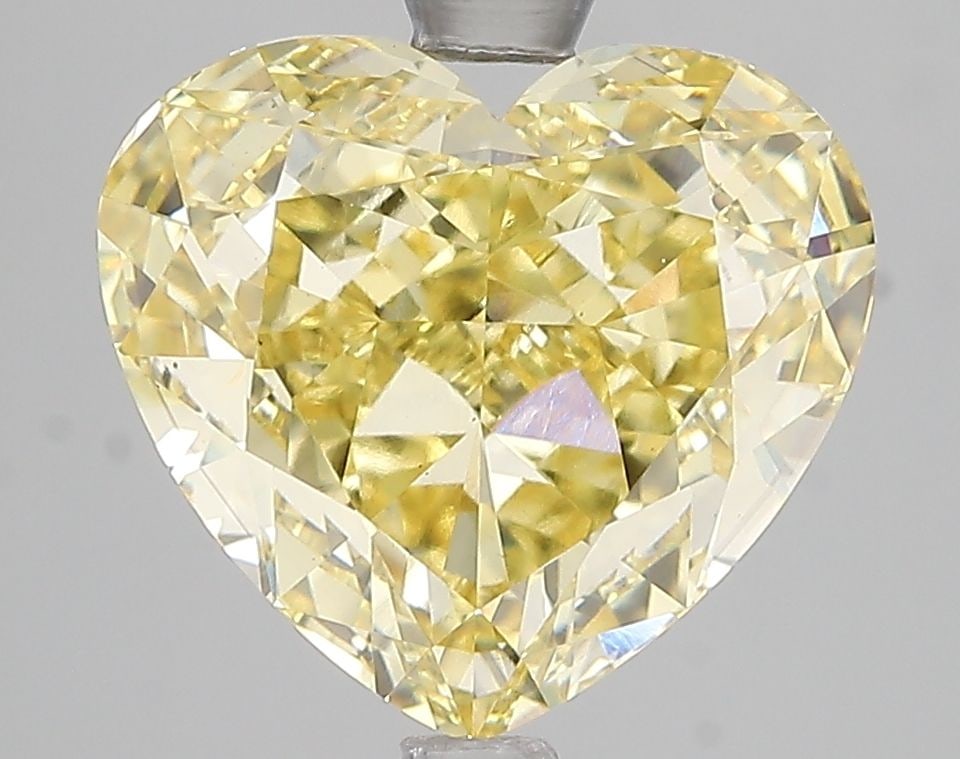 Loose Diamond - HEART 5.02ct Fancy Intense Yellow VS1: Loose Diamond - HEART 5.02ct Fancy Intense Yellow VS1 Source: This is a real non-mined Diamond that has been grown in a lab Shape: HEART Carats: 5.02 Color: Fancy Intense Yellow Certification: IGI Vid