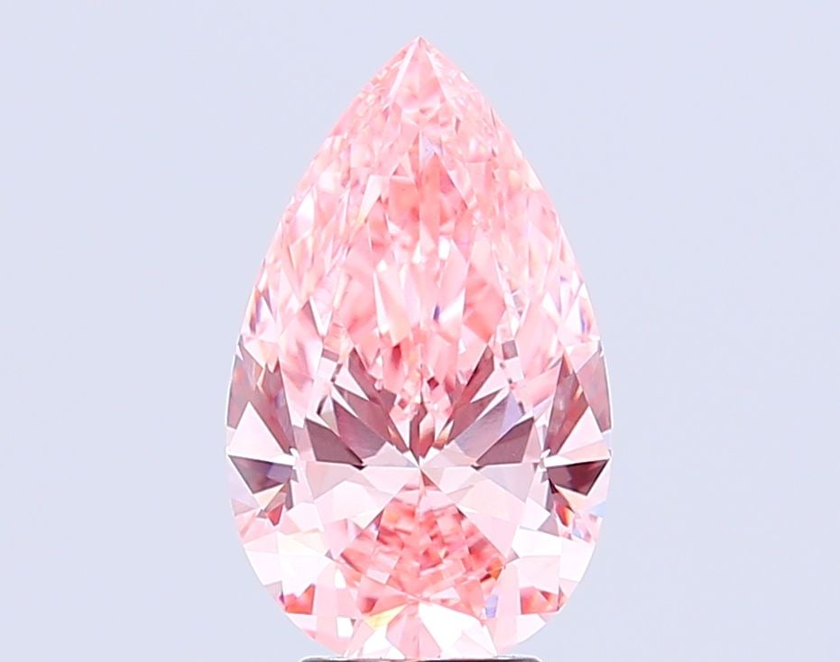 Loose Diamond - PEAR 5.76ct Fancy Vivid Pink VS1: Loose Diamond - PEAR 5.76ct Fancy Vivid Pink VS1 Source: This is a real non-mined Diamond that has been grown in a lab Shape: PEAR Carats: 5.76 Color: Fancy Vivid Pink Certification: IGI Video:
