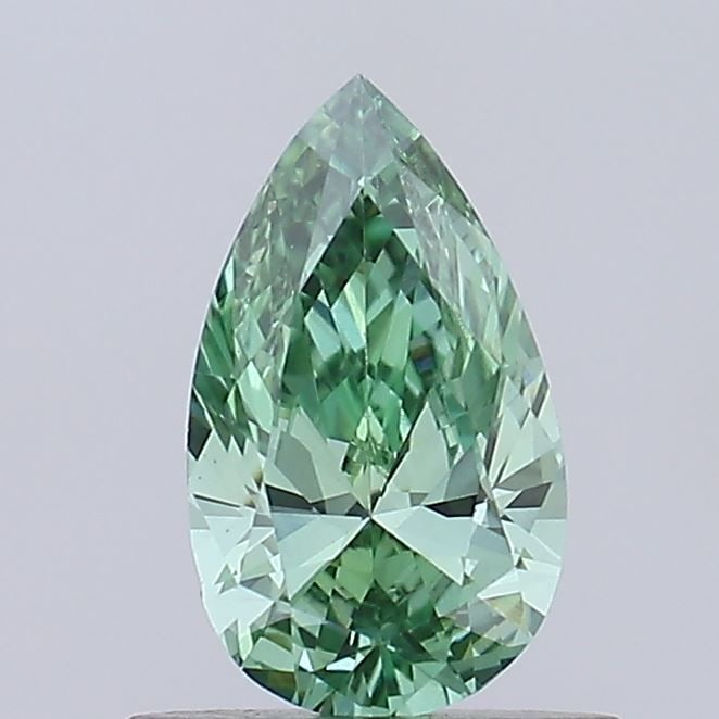 Loose Diamond - PEAR 0.54ct Fancy Vivid Green VVS2: Loose Diamond - PEAR 0.54ct Fancy Vivid Green VVS2 Source: This is a real non-mined Diamond that has been grown in a lab Shape: PEAR Carats: 0.54 Color: Fancy Vivid Green Certification: IGI Video: