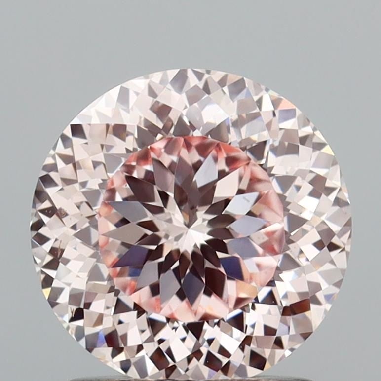 Loose Diamond - ROUND 1.44ct Fancy Light Pink VVS2: Loose Diamond - ROUND 1.44ct Fancy Light Pink VVS2 Source: This is a real non-mined Diamond that has been grown in a lab Shape: ROUND Carats: 1.44 Color: Fancy Light Pink Certification: IGI The Diamon