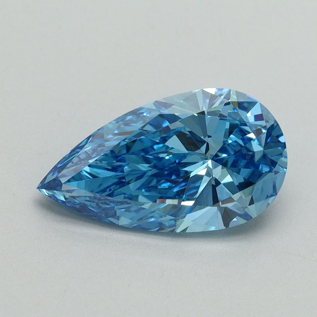 Loose Diamond - PEAR 2.01ct Fancy Vivid Blue VVS2: Loose Diamond - PEAR 2.01ct Fancy Vivid Blue VVS2 Source: This is a real non-mined Diamond that has been grown in a lab Shape: PEAR Carats: 2.01 Color: Fancy Vivid Blue Certification: IGI Video: