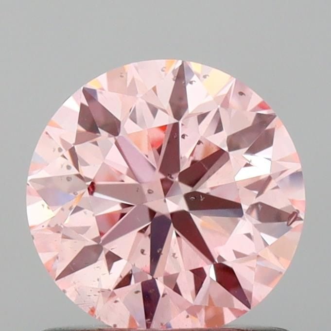 Loose Diamond - ROUND 0.93ct Fancy Intense Pink SI1: Loose Diamond - ROUND 0.93ct Fancy Intense Pink SI1 Source: This is a real non-mined Diamond that has been grown in a lab Shape: ROUND Carats: 0.93 Color: Fancy Intense Pink Certification: IGI Video: