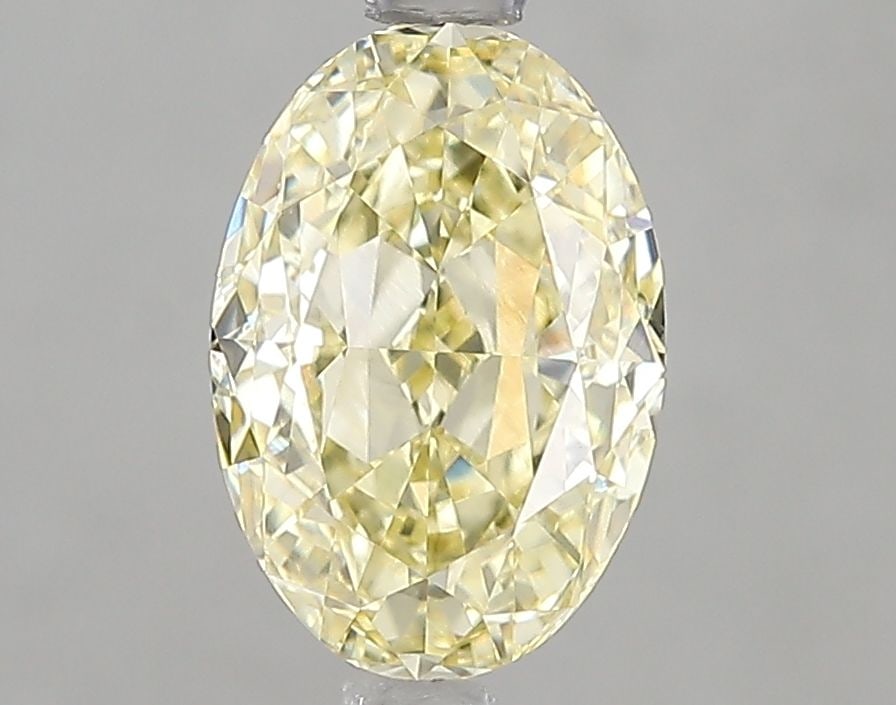 Loose Diamond - OVAL 2.01ct Fancy Intense Yellow VVS2: Loose Diamond - OVAL 2.01ct Fancy Intense Yellow VVS2 Source: This is a real non-mined Diamond that has been grown in a lab Shape: OVAL Carats: 2.01 Color: Fancy Intense Yellow Certification: IGI Vide