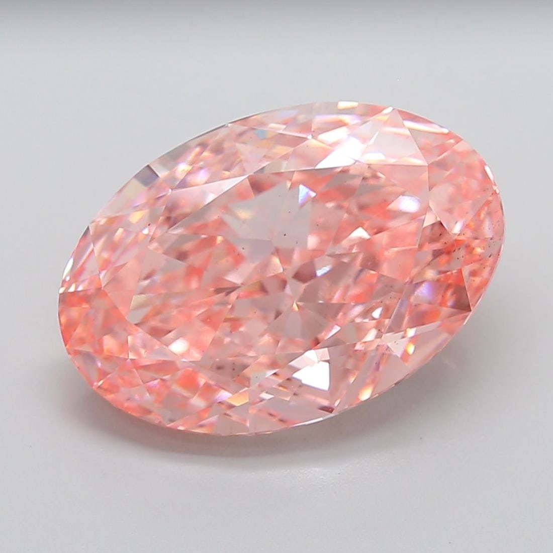 Loose Diamond - OVAL 17.1ct Fancy Vivid Pink VS2: Loose Diamond - OVAL 17.1ct Fancy Vivid Pink VS2 Source: This is a real non-mined Diamond that has been grown in a lab Shape: OVAL Carats: 17.1 Color: Fancy Vivid Pink Certification: IGI Video: