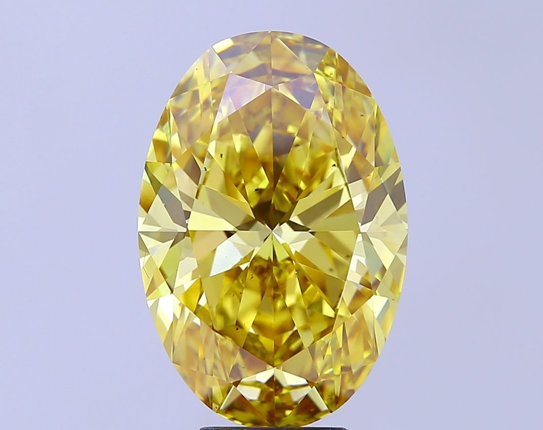 Loose Diamond - OVAL 8.05ct Fancy Vivid Yellow VS2: Loose Diamond - OVAL 8.05ct Fancy Vivid Yellow VS2 Source: This is a real non-mined Diamond that has been grown in a lab Shape: OVAL Carats: 8.05 Color: Fancy Vivid Yellow Certification: IGI Video: