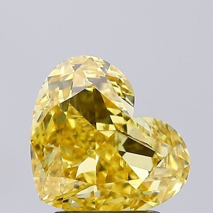 Loose Diamond - HEART 1.88ct Fancy Vivid Yellow VS2: Loose Diamond - HEART 1.88ct Fancy Vivid Yellow VS2 Source: This is a real non-mined Diamond that has been grown in a lab Shape: HEART Carats: 1.88 Color: Fancy Vivid Yellow Certification: IGI Video: