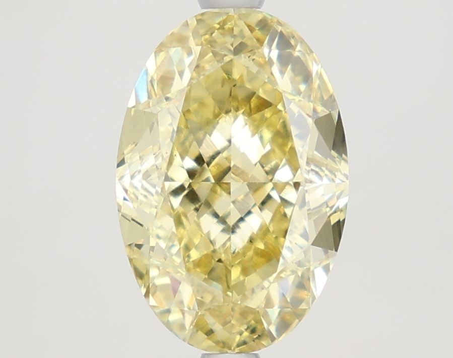 Loose Diamond - OVAL 3.26ct Fancy Intense Yellow VS1: Loose Diamond - OVAL 3.26ct Fancy Intense Yellow VS1 Source: This is a real non-mined Diamond that has been grown in a lab Shape: OVAL Carats: 3.26 Color: Fancy Intense Yellow Certification: IGI Video