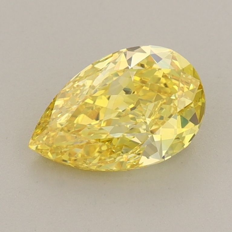 Loose Diamond - PEAR 1.1ct Fancy Vivid Yellow VS2: Loose Diamond - PEAR 1.1ct Fancy Vivid Yellow VS2 Source: This is a real non-mined Diamond that has been grown in a lab Shape: PEAR Carats: 1.1 Color: Fancy Vivid Yellow Certification: IGI Video: