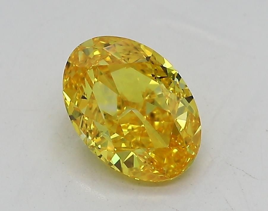 Loose Diamond - OVAL 1.07ct Fancy Vivid Yellow VVS2: Loose Diamond - OVAL 1.07ct Fancy Vivid Yellow VVS2 Source: This is a real non-mined Diamond that has been grown in a lab Shape: OVAL Carats: 1.07 Color: Fancy Vivid Yellow Certification: IGI Video: