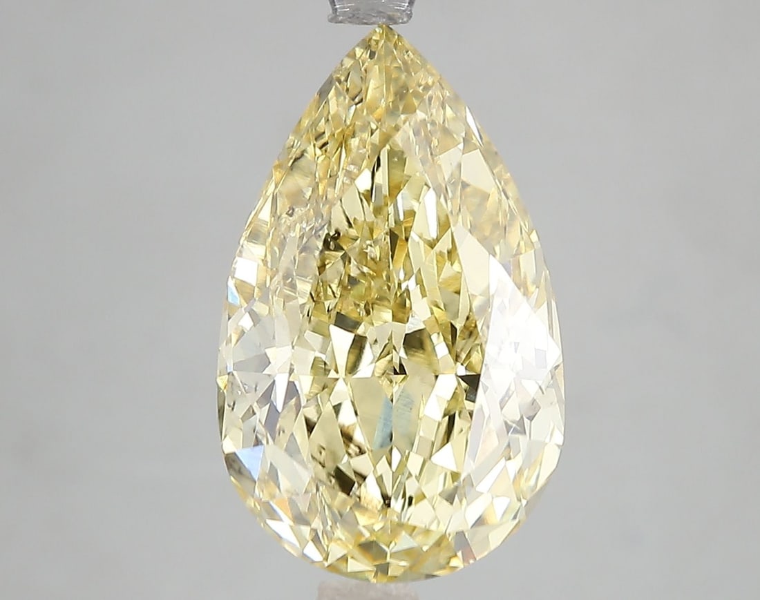 Loose Diamond - PEAR 6.03ct Fancy Intense Yellow SI1: Loose Diamond - PEAR 6.03ct Fancy Intense Yellow SI1 Source: This is a real non-mined Diamond that has been grown in a lab Shape: PEAR Carats: 6.03 Color: Fancy Intense Yellow Certification: IGI Video