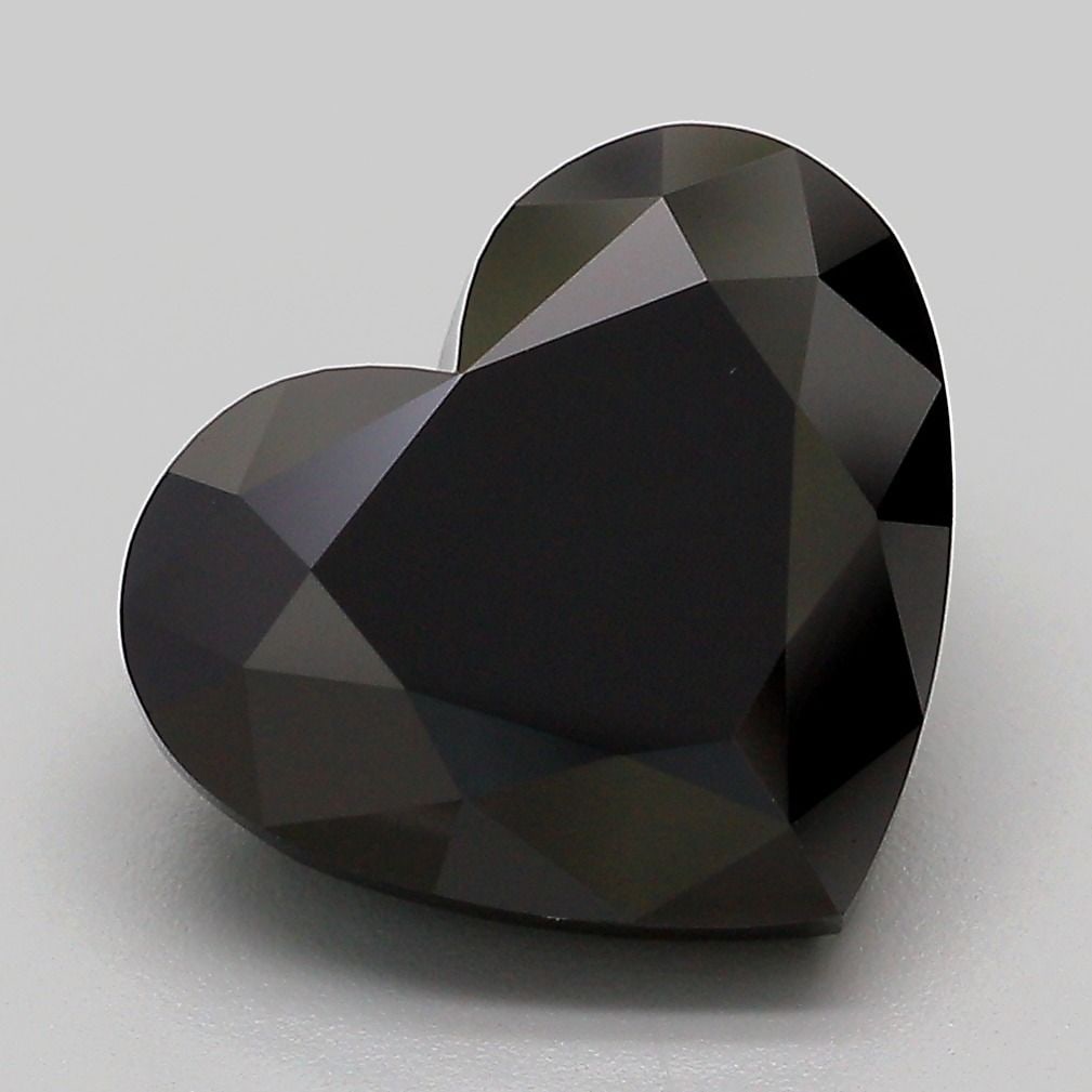 Loose Diamond - HEART 5.71ct Fancy Black: Loose Diamond - HEART 5.71ct Fancy Black Source: This is a real non-mined Diamond that has been grown in a lab Shape: HEART Carats: 5.71 Color: Fancy Black Certification: IGI Video: