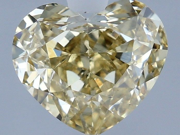 Loose Diamond - HEART 1.1ct Y-Z VS2: Loose Diamond - HEART 1.1ct Y-Z VS2 Source: This is a real non-mined Diamond that has been grown in a lab Shape: HEART Carats: 1.1 Color: Y-Z Certification: IGI Video: