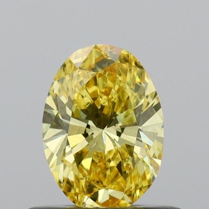 Loose Diamond - OVAL 0.47ct Fancy Vivid Yellow VS2: Loose Diamond - OVAL 0.47ct Fancy Vivid Yellow VS2 Source: This is a real non-mined Diamond that has been grown in a lab Shape: OVAL Carats: 0.47 Color: Fancy Vivid Yellow Certification: IGI Video: