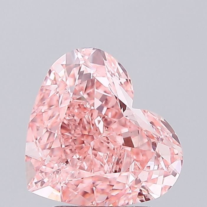 Loose Diamond - HEART 3.29ct Fancy Vivid Pink VVS2: Loose Diamond - HEART 3.29ct Fancy Vivid Pink VVS2 Source: This is a real non-mined Diamond that has been grown in a lab Shape: HEART Carats: 3.29 Color: Fancy Vivid Pink Certification: IGI Video: