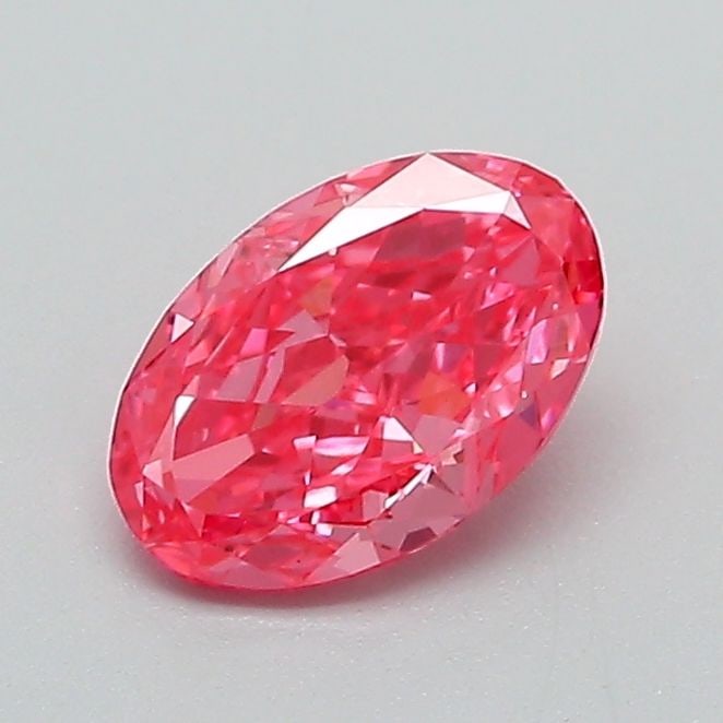 Loose Diamond - OVAL 0.69ct Fancy Vivid Pink VS2: Loose Diamond - OVAL 0.69ct Fancy Vivid Pink VS2 Source: This is a real non-mined Diamond that has been grown in a lab Shape: OVAL Carats: 0.69 Color: Fancy Vivid Pink Certification: IGI Video: