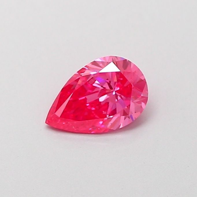 Loose Diamond - PEAR 0.58ct Fancy Vivid Pink VS1: Loose Diamond - PEAR 0.58ct Fancy Vivid Pink VS1 Source: This is a real non-mined Diamond that has been grown in a lab Shape: PEAR Carats: 0.58 Color: Fancy Vivid Pink Certification: IGI Video: