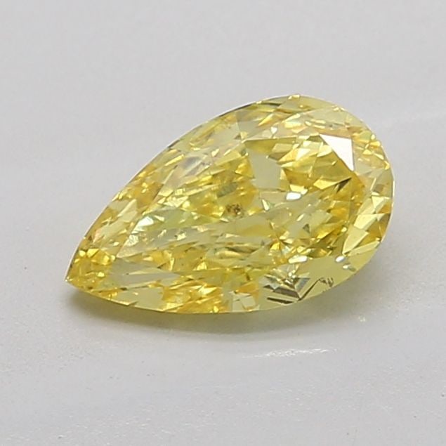 Loose Diamond - PEAR 1.24ct Fancy Vivid Yellow VS1: Loose Diamond - PEAR 1.24ct Fancy Vivid Yellow VS1 Source: This is a real non-mined Diamond that has been grown in a lab Shape: PEAR Carats: 1.24 Color: Fancy Vivid Yellow Certification: IGI Video: