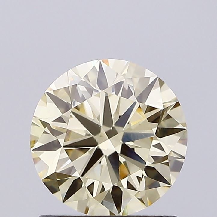 Loose Diamond - ROUND 0.89ct Fancy Light Brownish Yellow VS1: Loose Diamond - ROUND 0.89ct Fancy Light Brownish Yellow VS1 Source: This is a real non-mined Diamond that has been grown in a lab Shape: ROUND Carats: 0.89 Color: Fancy Light Brownish Yellow Certific
