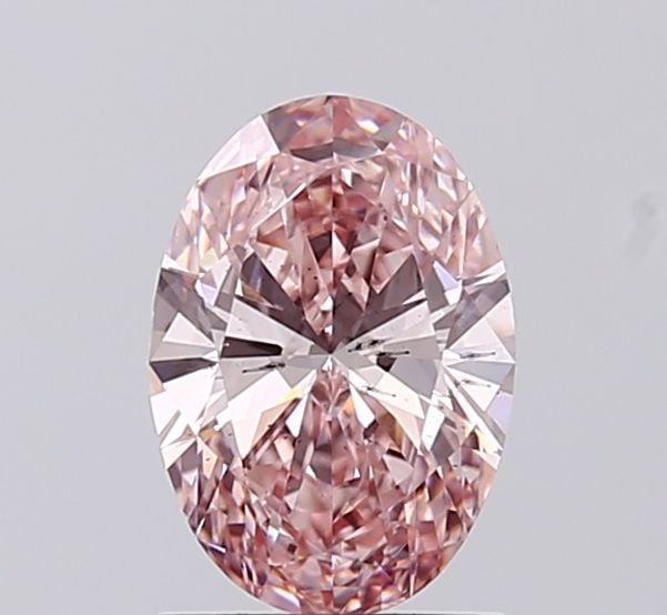 Loose Diamond - OVAL 1.0ct Fancy Vivid Pink SI1: Loose Diamond - OVAL 1.0ct Fancy Vivid Pink SI1 Source: This is a real non-mined Diamond that has been grown in a lab Shape: OVAL Carats: 1.0 Color: Fancy Vivid Pink Certification: IGI Video: