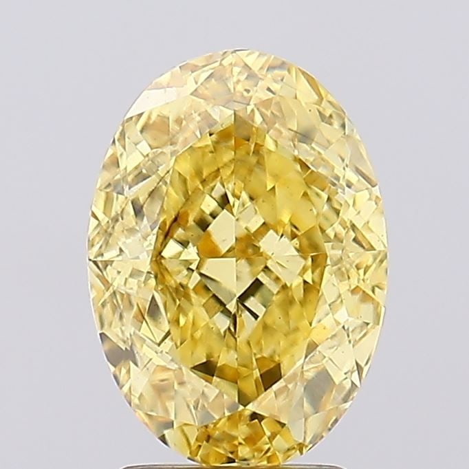 Loose Diamond - OVAL 3.08ct Fancy Vivid Yellow SI1: Loose Diamond - OVAL 3.08ct Fancy Vivid Yellow SI1 Source: This is a real non-mined Diamond that has been grown in a lab Shape: OVAL Carats: 3.08 Color: Fancy Vivid Yellow Certification: IGI Video:
