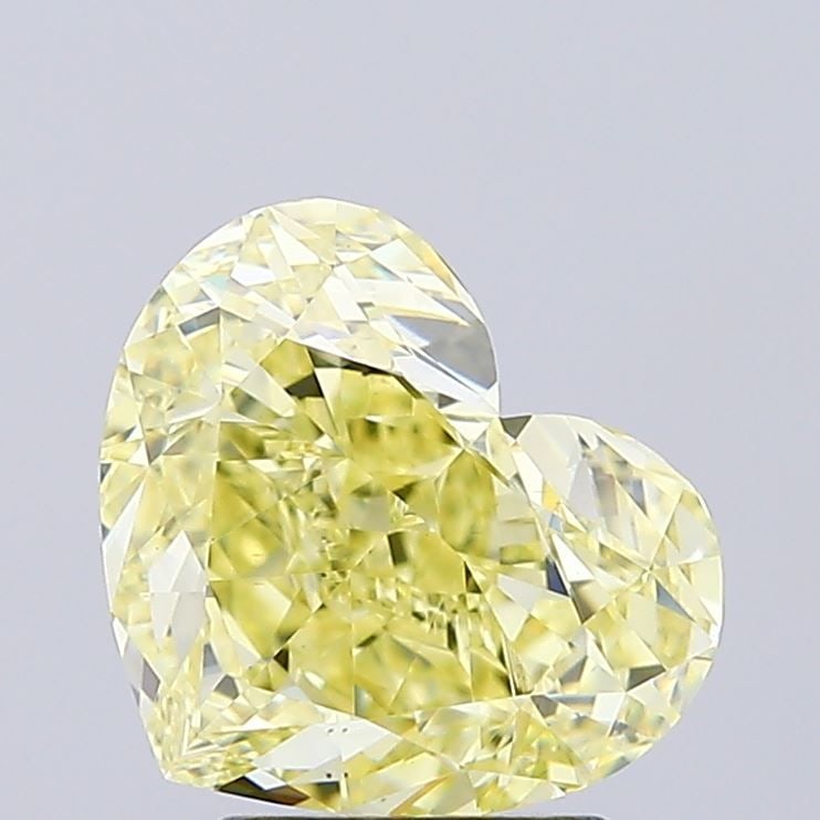 Loose Diamond - HEART 3.02ct Fancy Intense Yellow VS1: Loose Diamond - HEART 3.02ct Fancy Intense Yellow VS1 Source: This is a real non-mined Diamond that has been grown in a lab Shape: HEART Carats: 3.02 Color: Fancy Intense Yellow Certification: IGI Vid