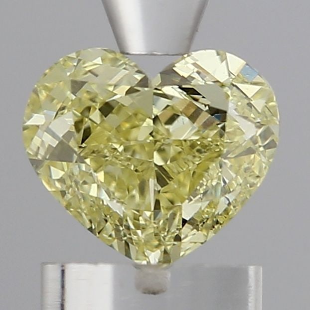 Loose Diamond - HEART 1.09ct Fancy Intense Yellow VS2: Loose Diamond - HEART 1.09ct Fancy Intense Yellow VS2 Source: This is a real non-mined Diamond that has been grown in a lab Shape: HEART Carats: 1.09 Color: Fancy Intense Yellow Certification: IGI Vid