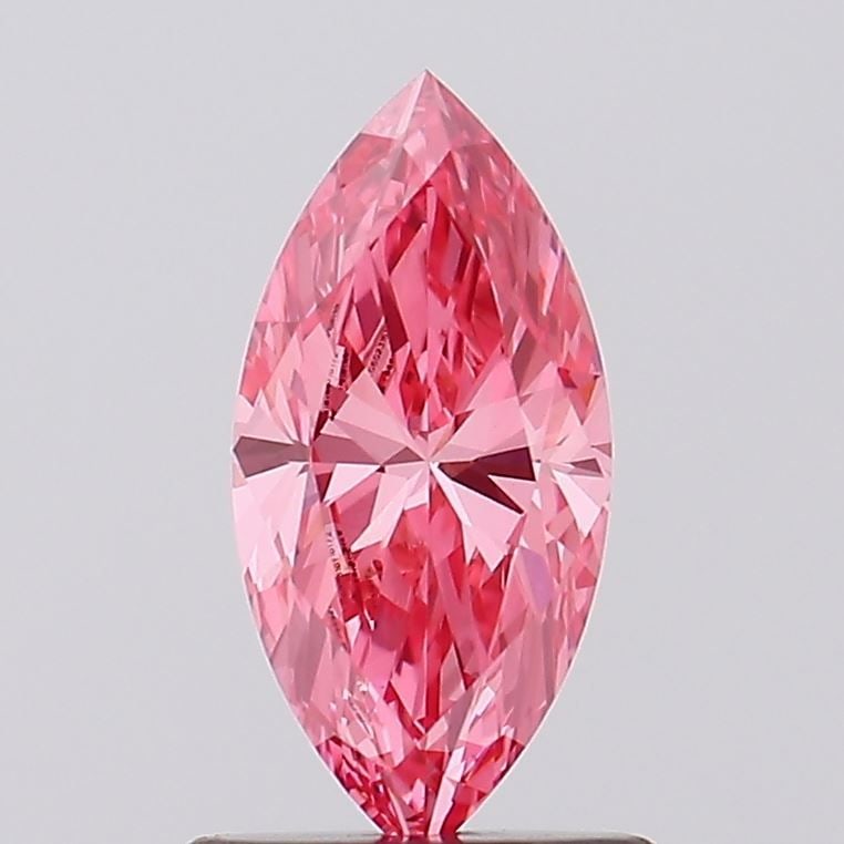 Loose Diamond - MARQUISE 0.79ct Fancy Vivid Pink VVS2: Loose Diamond - MARQUISE 0.79ct Fancy Vivid Pink VVS2 Source: This is a real non-mined Diamond that has been grown in a lab Shape: MARQUISE Carats: 0.79 Color: Fancy Vivid Pink Certification: IGI Vide