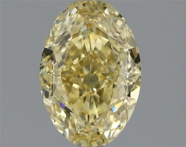 Loose Diamond - OVAL 1.32ct Fancy Intense Yellow VS1: Loose Diamond - OVAL 1.32ct Fancy Intense Yellow VS1 Source: This is a real non-mined Diamond that has been grown in a lab Shape: OVAL Carats: 1.32 Color: Fancy Intense Yellow Certification: IGI Video