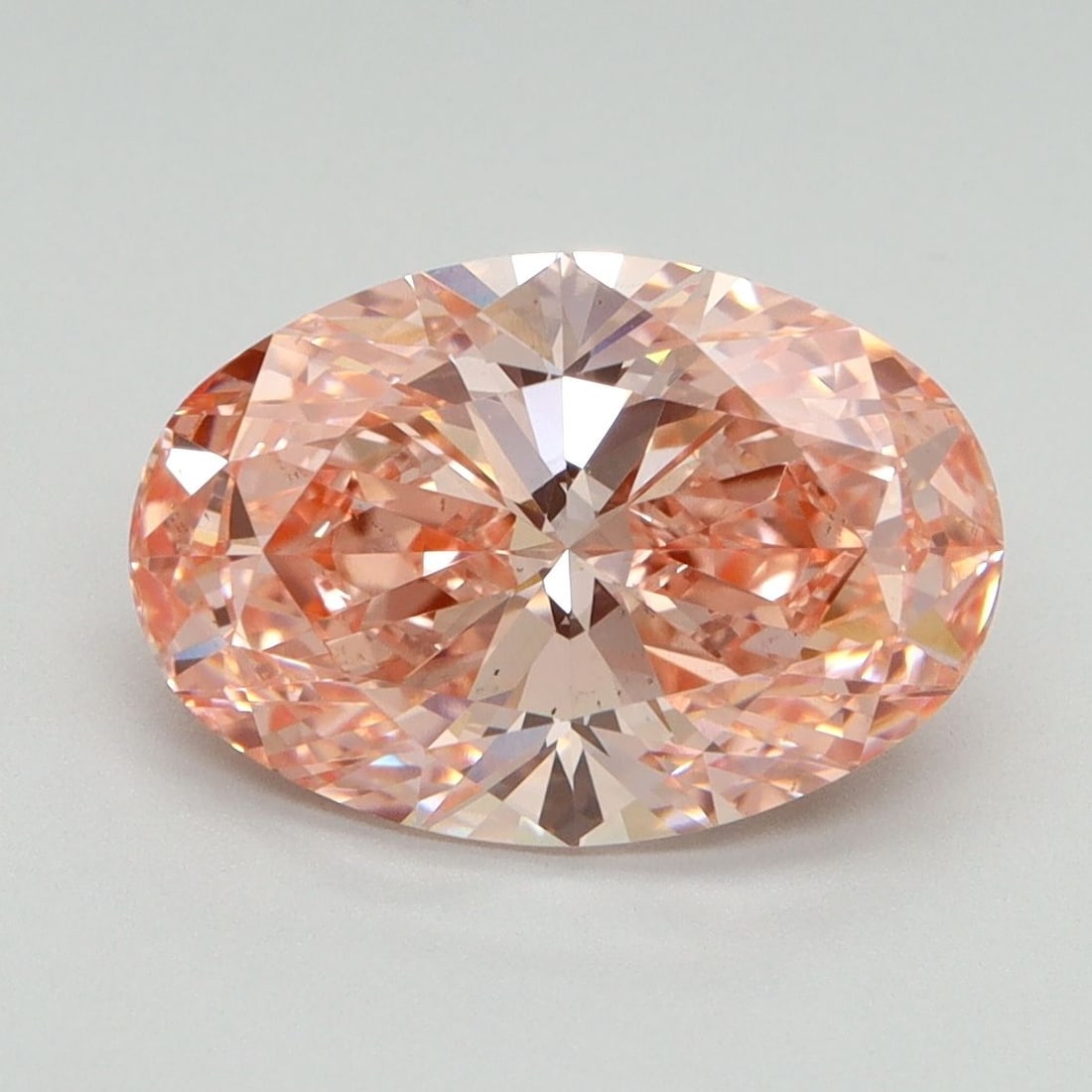 Loose Diamond - OVAL 3.16ct Fancy Vivid Pink VS2: Loose Diamond - OVAL 3.16ct Fancy Vivid Pink VS2 Source: This is a real non-mined Diamond that has been grown in a lab Shape: OVAL Carats: 3.16 Color: Fancy Vivid Pink Certification: IGI Video: