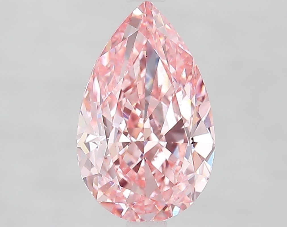 Loose Diamond - PEAR 3.02ct Fancy Vivid Pink VS2: Loose Diamond - PEAR 3.02ct Fancy Vivid Pink VS2 Source: This is a real non-mined Diamond that has been grown in a lab Shape: PEAR Carats: 3.02 Color: Fancy Vivid Pink Certification: IGI Video: