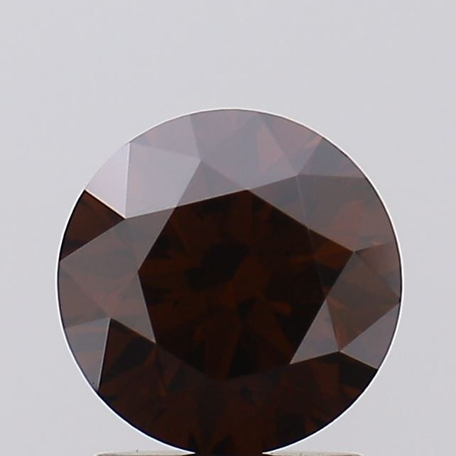 Loose Diamond - ROUND 1.57ct Fancy Deep Brown VVS2: Loose Diamond - ROUND 1.57ct Fancy Deep Brown VVS2 Source: This is a real non-mined Diamond that has been grown in a lab Shape: ROUND Carats: 1.57 Color: Fancy Deep Brown Certification: IGI Video:
