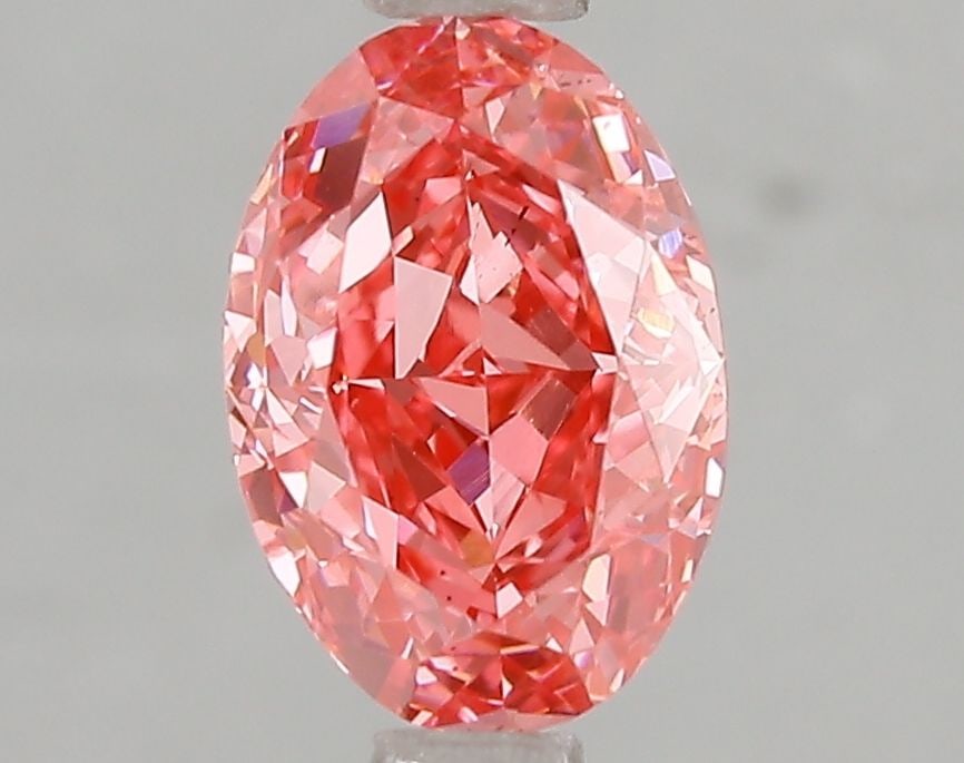 Loose Diamond - OVAL 1.59ct Fancy Vivid Pink VS2: Loose Diamond - OVAL 1.59ct Fancy Vivid Pink VS2 Source: This is a real non-mined Diamond that has been grown in a lab Shape: OVAL Carats: 1.59 Color: Fancy Vivid Pink Certification: IGI Video: