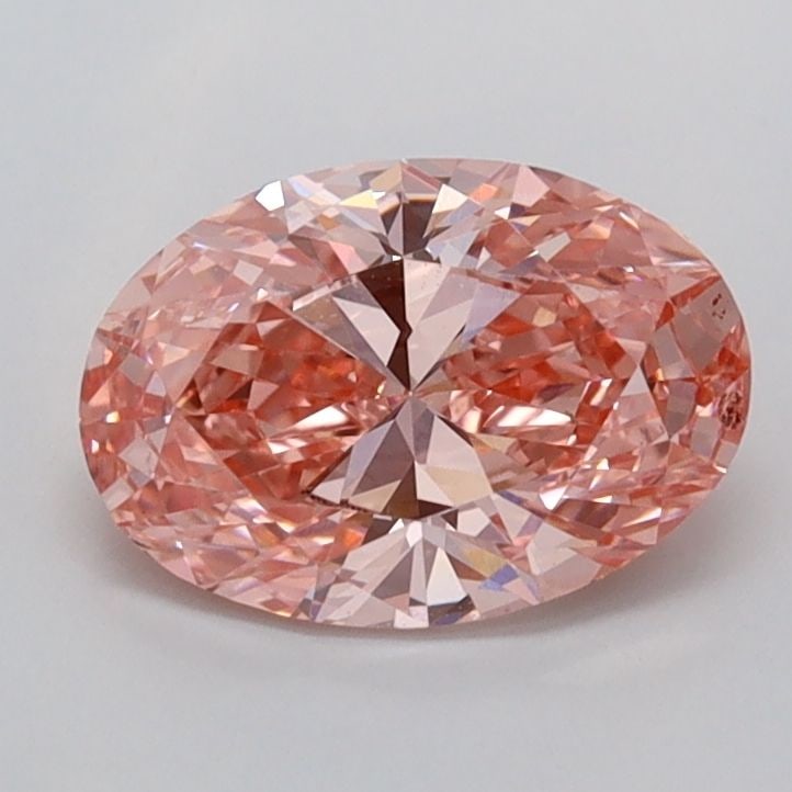 Loose Diamond - OVAL 1.05ct Fancy Vivid Pink VVS2: Loose Diamond - OVAL 1.05ct Fancy Vivid Pink VVS2 Source: This is a real non-mined Diamond that has been grown in a lab Shape: OVAL Carats: 1.05 Color: Fancy Vivid Pink Certification: IGI Video: