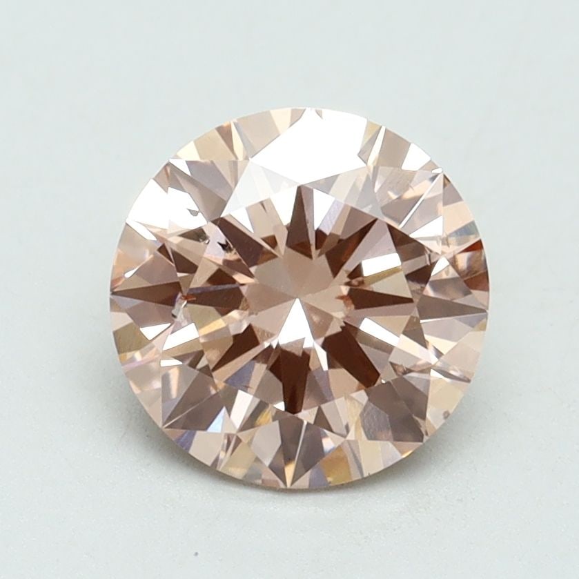 Loose Diamond - ROUND 1.5ct Fancy Intense Pink SI1: Loose Diamond - ROUND 1.5ct Fancy Intense Pink SI1 Source: This is a real non-mined Diamond that has been grown in a lab Shape: ROUND Carats: 1.5 Color: Fancy Intense Pink Certification: IGI Video: