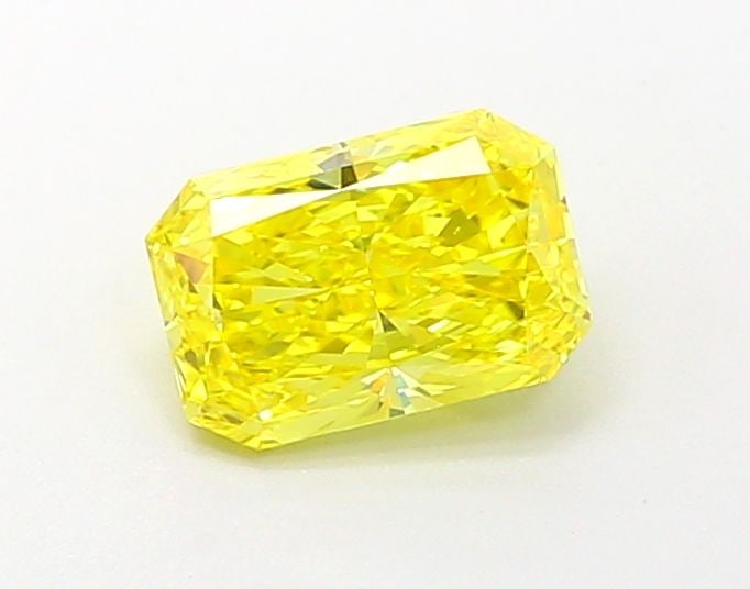 Loose Diamond - RADIANT 1.01ct Fancy Vivid Yellow VS1: Loose Diamond - RADIANT 1.01ct Fancy Vivid Yellow VS1 Source: This is a real non-mined Diamond that has been grown in a lab Shape: RADIANT Carats: 1.01 Color: Fancy Vivid Yellow Certification: IGI Vid