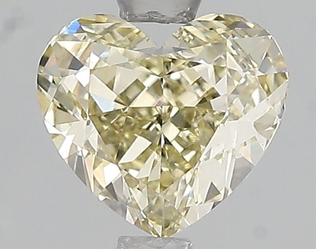 Loose Diamond - HEART 1.5ct Fancy Light Yellow VS2: Loose Diamond - HEART 1.5ct Fancy Light Yellow VS2 Source: This is a real non-mined Diamond that has been grown in a lab Shape: HEART Carats: 1.5 Color: Fancy Light Yellow Certification: IGI Video: