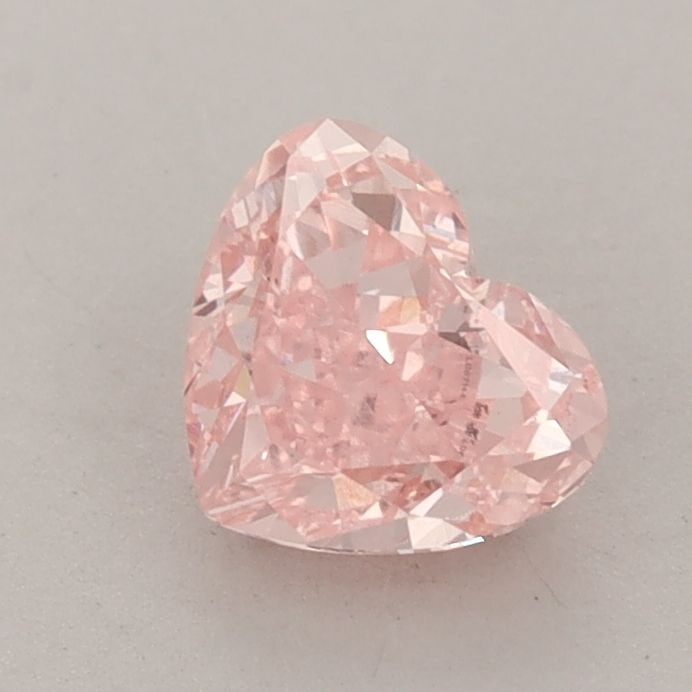 Loose Diamond - HEART 0.99ct Fancy Vivid Pink VS1: Loose Diamond - HEART 0.99ct Fancy Vivid Pink VS1 Source: This is a real non-mined Diamond that has been grown in a lab Shape: HEART Carats: 0.99 Color: Fancy Vivid Pink Certification: IGI Video: