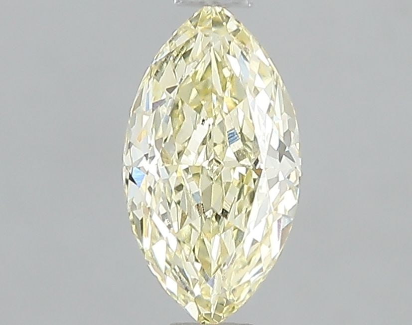 Loose Diamond - MARQUISE 1.06ct Fancy Light Yellow VVS2: Loose Diamond - MARQUISE 1.06ct Fancy Light Yellow VVS2 Source: This is a real non-mined Diamond that has been grown in a lab Shape: MARQUISE Carats: 1.06 Color: Fancy Light Yellow Certification: IGI 