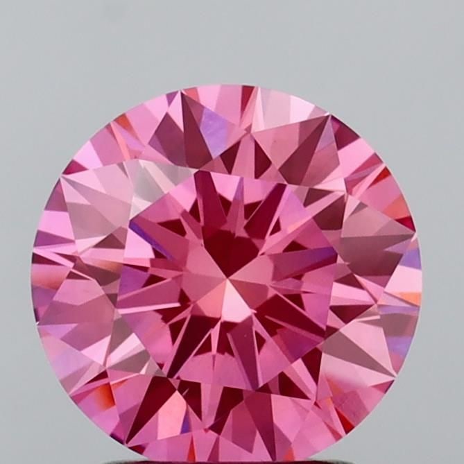 Ideal Loose Diamond - ROUND 2.01ct Fancy Vivid Pink VVS2: Ideal Loose Diamond - ROUND 2.01ct Fancy Vivid Pink VVS2 Source: This is a real non-mined Diamond that has been grown in a lab Shape: ROUND Carats: 2.01 Color: Fancy Vivid Pink Certification: IGI Vide