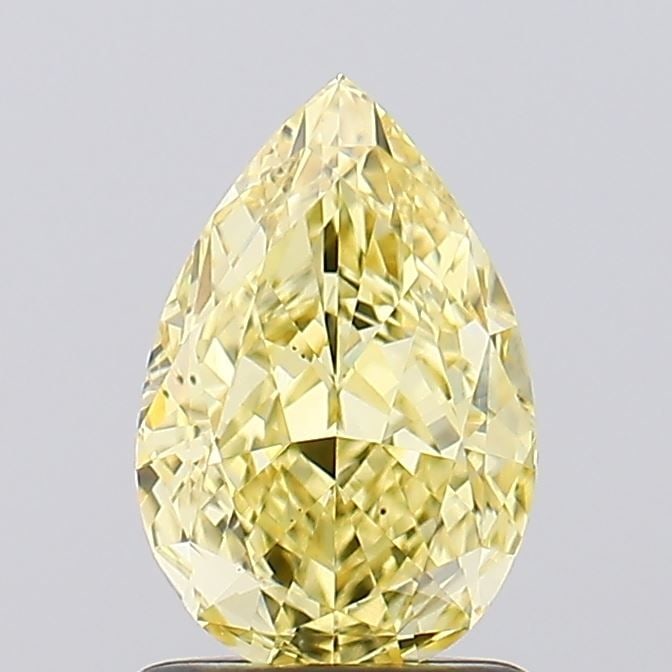 Loose Diamond - PEAR 1.39ct Fancy Vivid Yellow VS1: Loose Diamond - PEAR 1.39ct Fancy Vivid Yellow VS1 Source: This is a real non-mined Diamond that has been grown in a lab Shape: PEAR Carats: 1.39 Color: Fancy Vivid Yellow Certification: IGI Video: