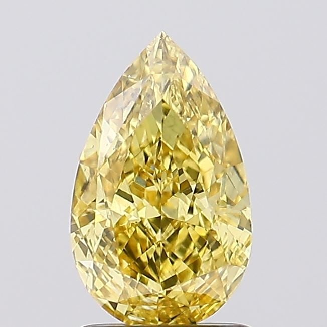 Loose Diamond - PEAR 1.6ct Fancy Vivid Yellow VS2: Loose Diamond - PEAR 1.6ct Fancy Vivid Yellow VS2 Source: This is a real non-mined Diamond that has been grown in a lab Shape: PEAR Carats: 1.6 Color: Fancy Vivid Yellow Certification: IGI Video: