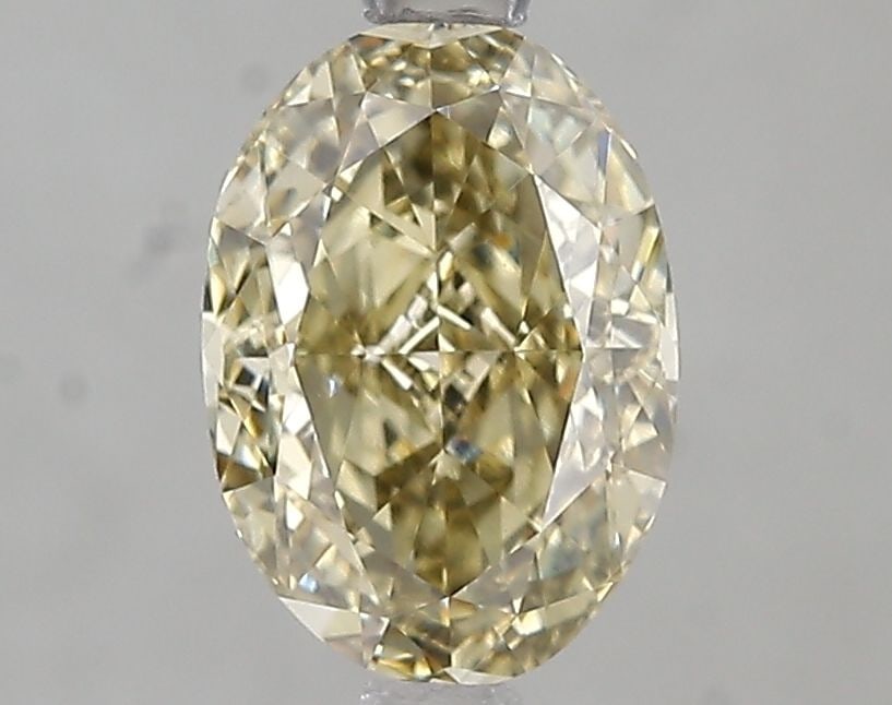 Loose Diamond - OVAL 1.59ct Fancy Yellow VVS2: Loose Diamond - OVAL 1.59ct Fancy Yellow VVS2 Source: This is a real non-mined Diamond that has been grown in a lab Shape: OVAL Carats: 1.59 Color: Fancy Yellow Certification: IGI Video: